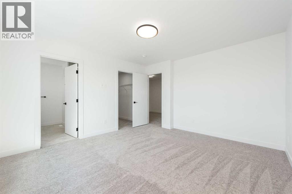 104 Heritage Manor, Cochrane, Alberta  T4C 3K8 - Photo 19 - A2304483