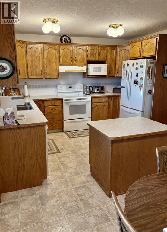 915 Highland Green Drive NW, High River, Alberta  T1V 1V8 - Photo 4 - A2303971