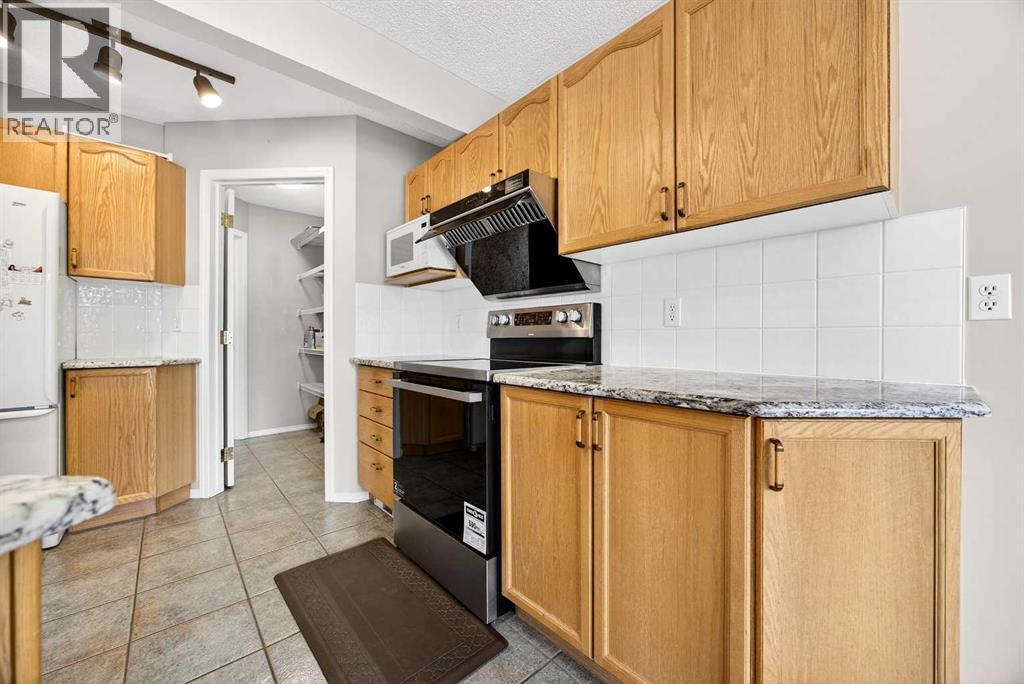 287 Panamount Drive NW, Calgary, Alberta  T3K 5L9 - Photo 9 - A2290564