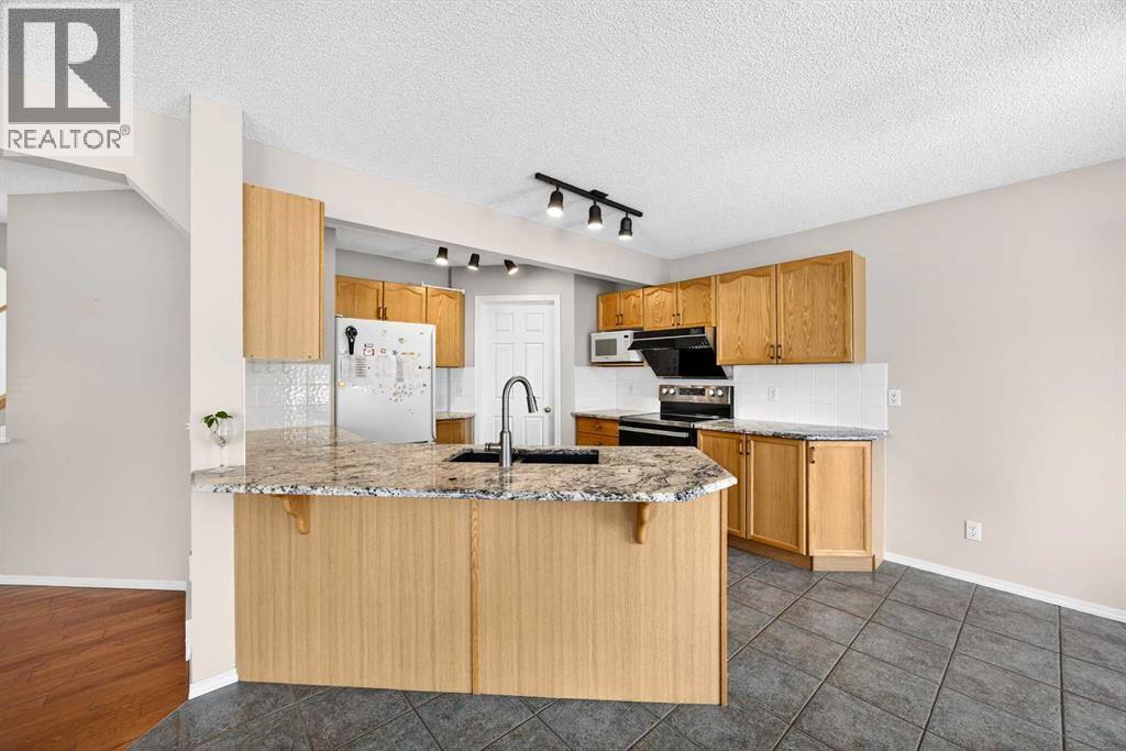 287 Panamount Drive NW, Calgary, Alberta  T3K 5L9 - Photo 8 - A2290564