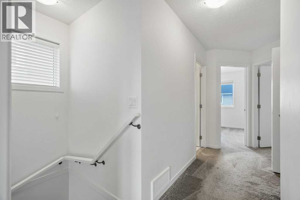 409 South Point Lane SW, Airdrie, Alberta  T4B 5G8 - Photo 17 - A2304977