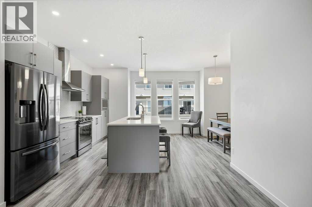 409 South Point Lane SW, Airdrie, Alberta  T4B 5G8 - Photo 3 - A2304977