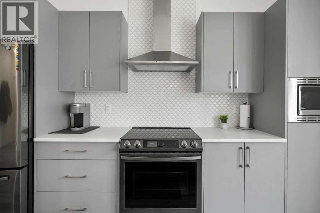 409 South Point Lane SW, Airdrie, Alberta  T4B 5G8 - Photo 6 - A2304977