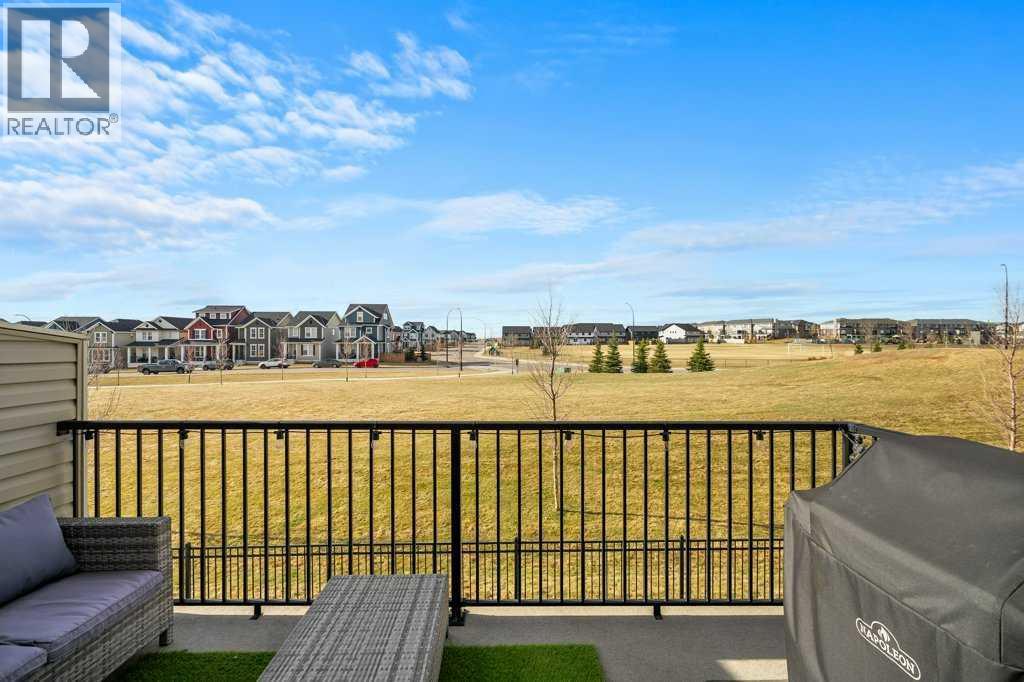 409 South Point Lane SW, Airdrie, Alberta  T4B 5G8 - Photo 2 - A2304977