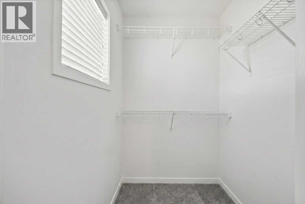 409 South Point Lane SW, Airdrie, Alberta  T4B 5G8 - Photo 21 - A2304977