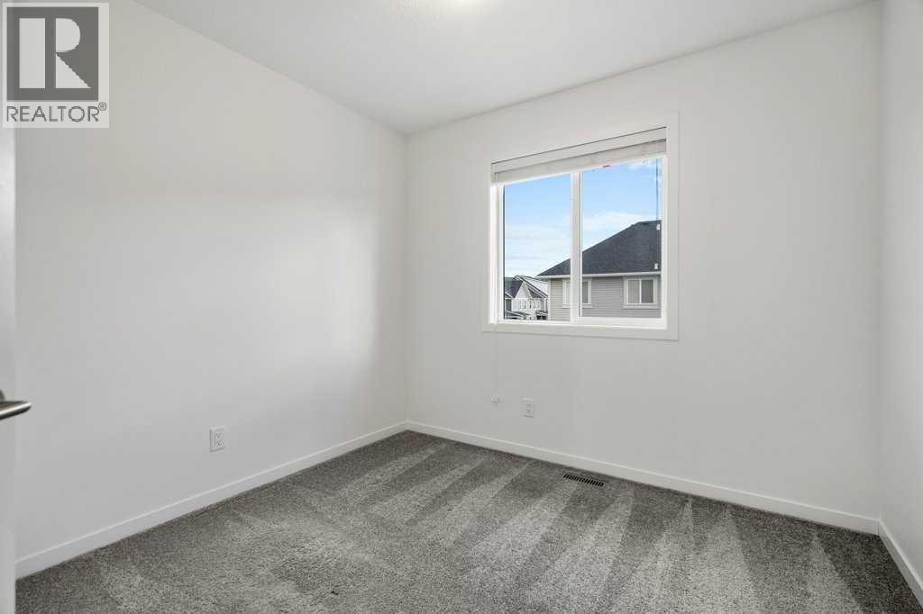 409 South Point Lane SW, Airdrie, Alberta  T4B 5G8 - Photo 25 - A2304977