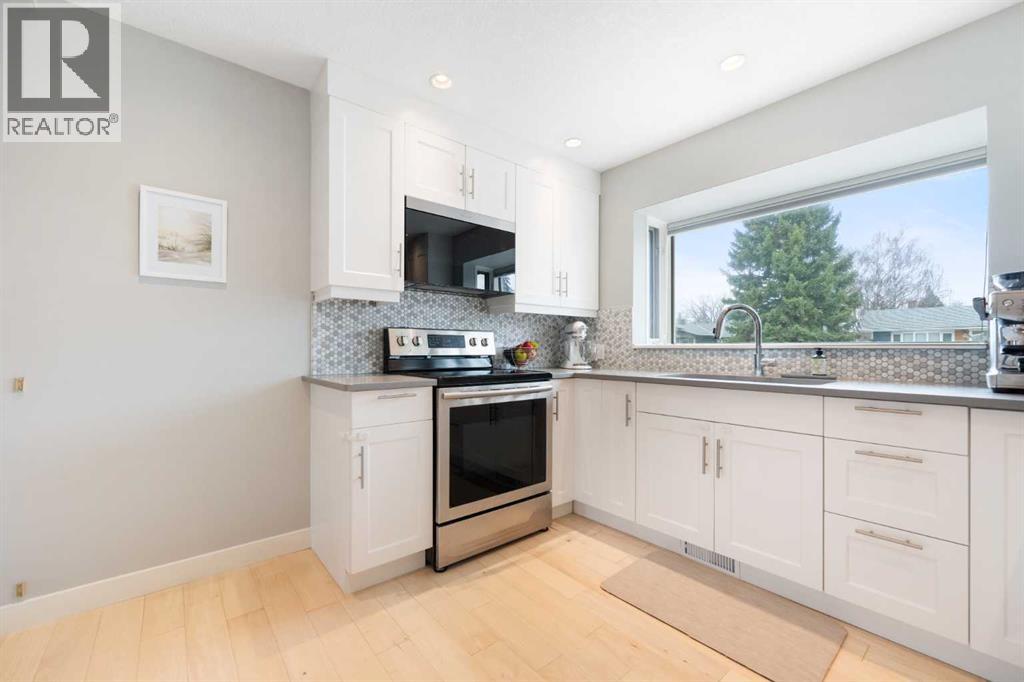 1412 89 Avenue Sw, Calgary, Alberta  T2V 0W8 - Photo 10 - A2301481