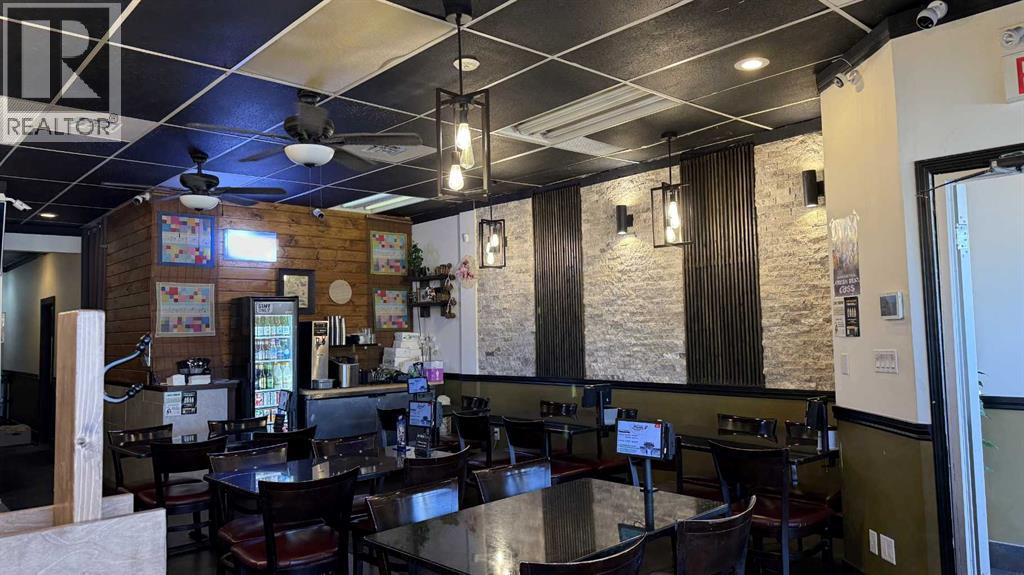 104, 3400 14 Street, Calgary, Alberta  T2K 1H9 - Photo 1 - A2305309