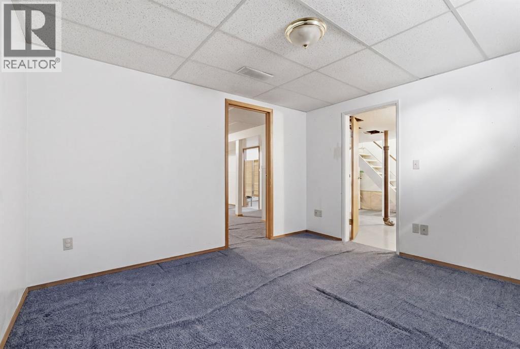 5044 Norris Road Nw, Calgary, Alberta  T2K 2P9 - Photo 35 - A2305129