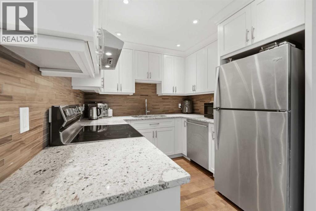 52a Millcrest Green SW, Calgary, Alberta  T2Y 2K1 - Photo 5 - A2301094