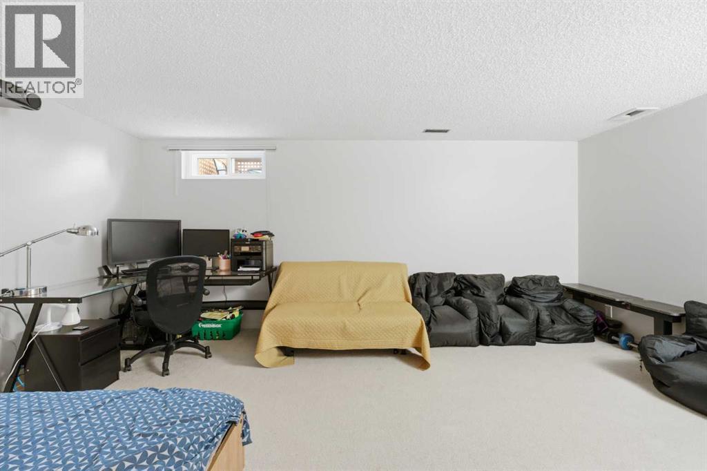 52a Millcrest Green SW, Calgary, Alberta  T2Y 2K1 - Photo 22 - A2301094