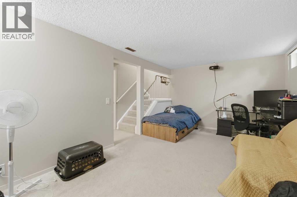 52a Millcrest Green SW, Calgary, Alberta  T2Y 2K1 - Photo 23 - A2301094