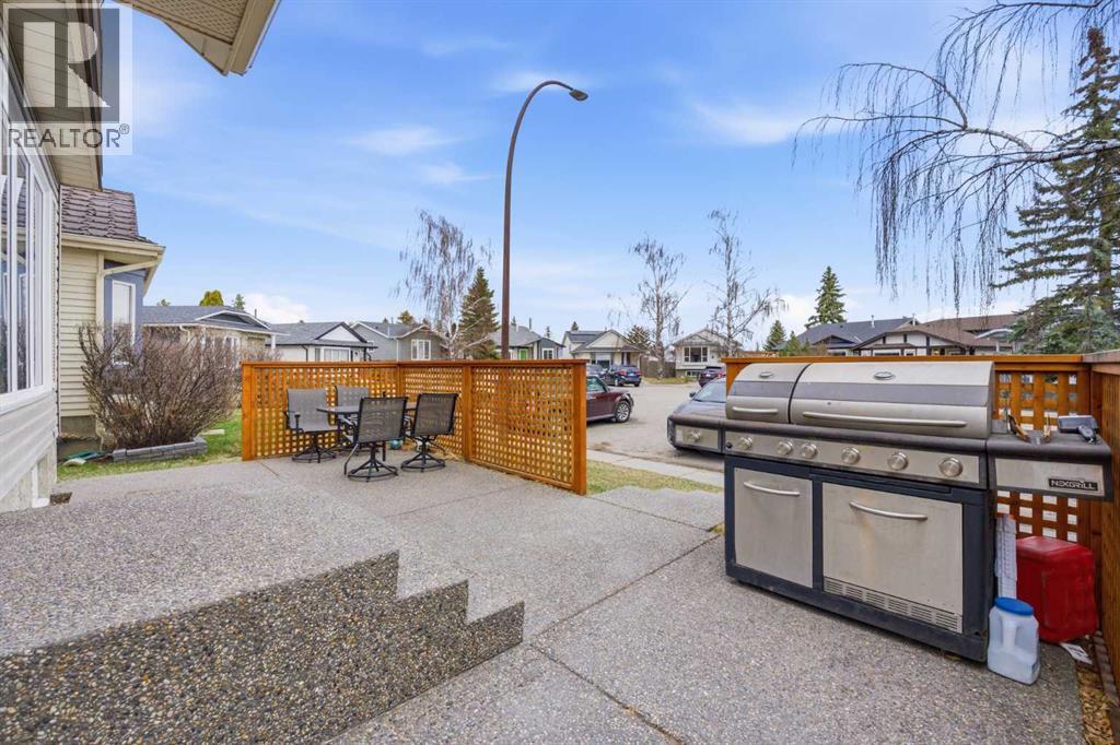 52a Millcrest Green SW, Calgary, Alberta  T2Y 2K1 - Photo 2 - A2301094