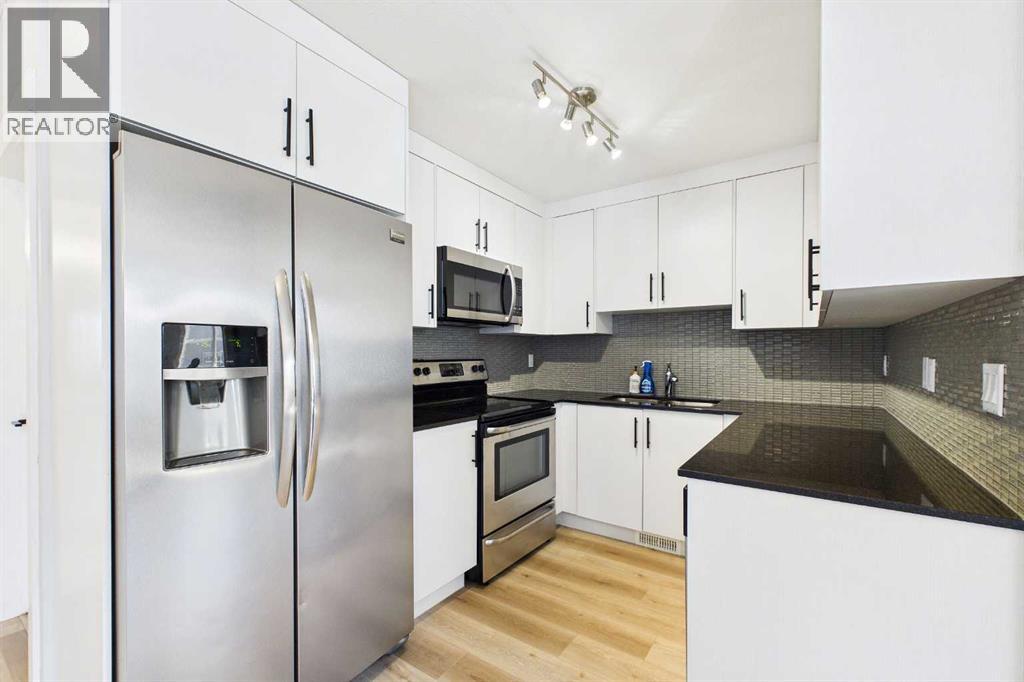 1, 67 West Coach Manor SW, Calgary, Alberta  T3H 1R7 - Photo 10 - A2302694