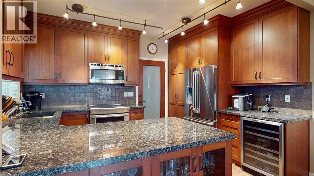 604, 1997 Sirocco Drive SW, Calgary, Alberta  T3H 3E6 - Photo 4 - A2304547