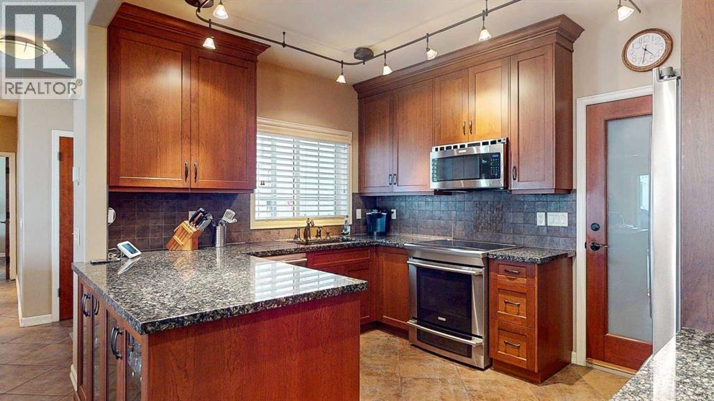 604, 1997 Sirocco Drive SW, Calgary, Alberta  T3H 3E6 - Photo 3 - A2304547