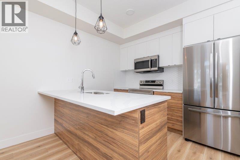 706, 10060 46 Street NE, Calgary, Alberta  T3J 2H8 - Photo 3 - A2268486