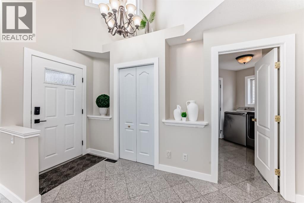 311 Rocky Ridge Cove NW, Calgary, Alberta  T3G 4K1 - Photo 3 - A2300845