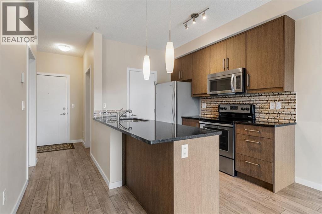311, 402 Marquis Lane SE, Calgary, Alberta  T3M 2G7 - Photo 6 - A2303132
