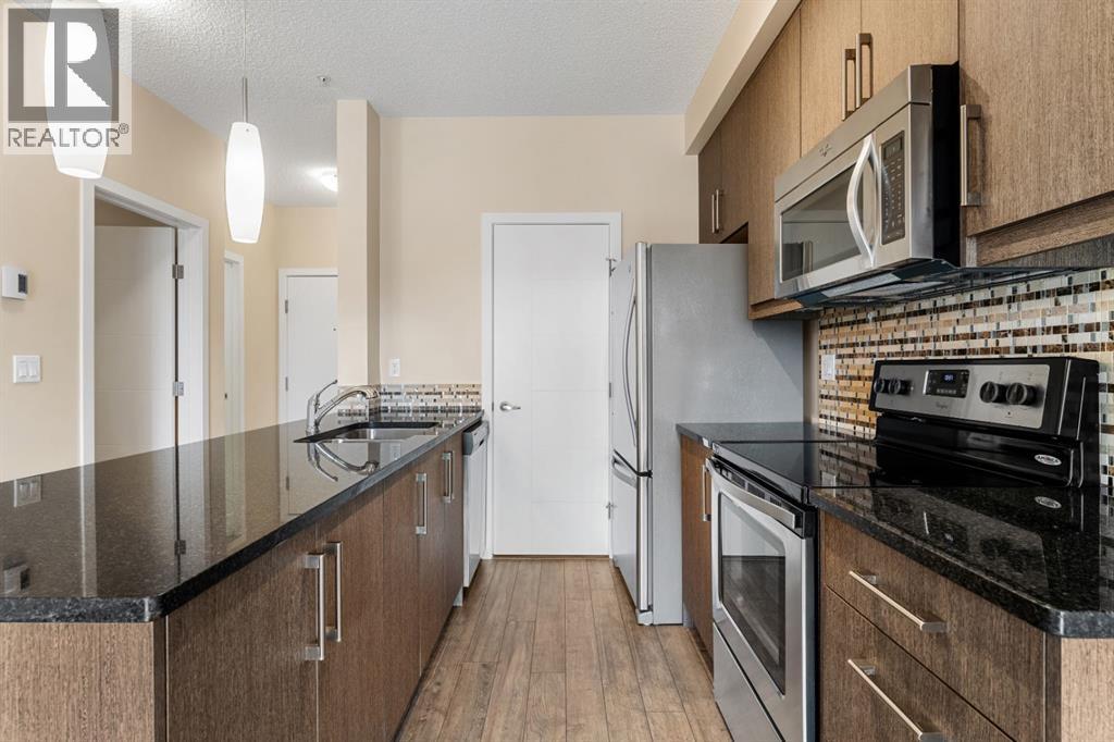 311, 402 Marquis Lane SE, Calgary, Alberta  T3M 2G7 - Photo 9 - A2303132