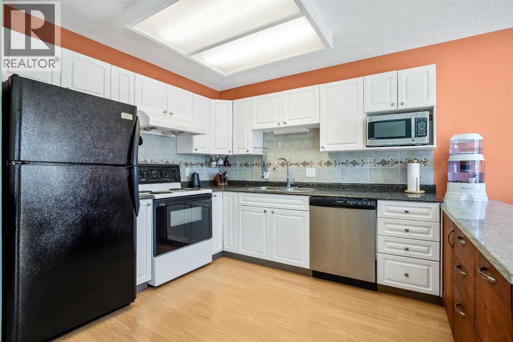 240 27 Avenue NW, Calgary, Alberta  T2M 2H4 - Photo 5 - A2303733