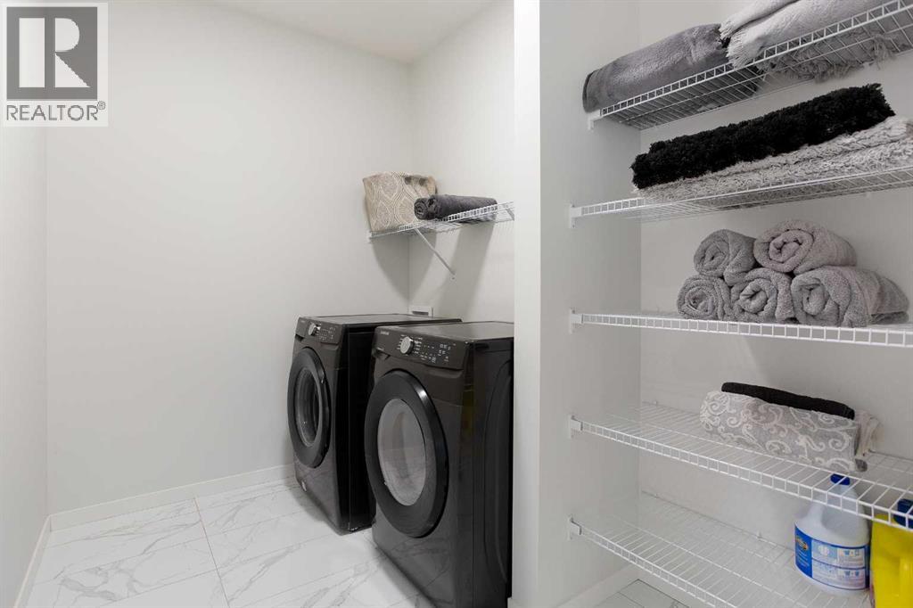 206 Rowley Way NW, Calgary, Alberta  T3L 0G7 - Photo 31 - A2304849