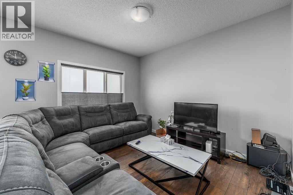 313 Hillcrest Road Sw, Airdrie, Alberta  T4B 4K1 - Photo 8 - A2297458