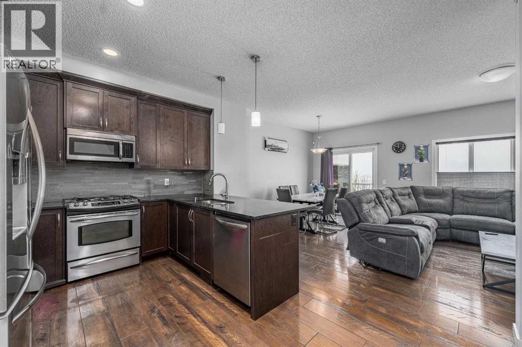 313 Hillcrest Road Sw, Airdrie, Alberta  T4B 4K1 - Photo 5 - A2297458