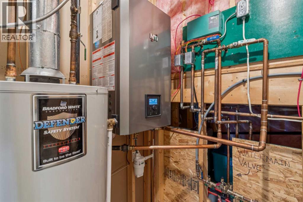 10 Bow Ridge Lane, Cochrane, Alberta  T4C 1T6 - Photo 32 - A2303344