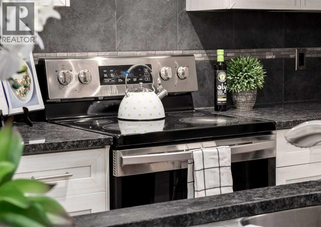 63 Panton Way NW, Calgary, Alberta  T3K 0X6 - Photo 9 - A2283741