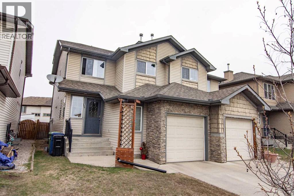 754 Luxstone Gate SW, Airdrie, Alberta  T4B 0H3 - Photo 1 - A2305074