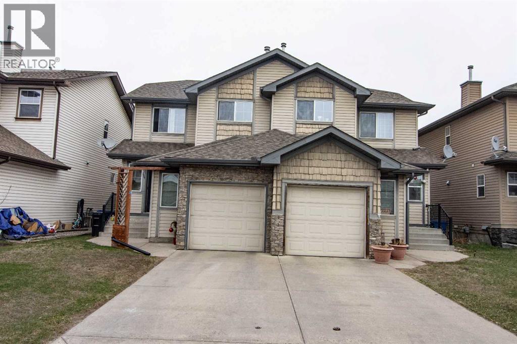 754 Luxstone Gate SW, Airdrie, Alberta  T4B 0H3 - Photo 2 - A2305074