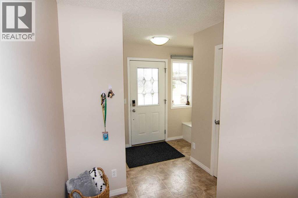 754 Luxstone Gate SW, Airdrie, Alberta  T4B 0H3 - Photo 7 - A2305074