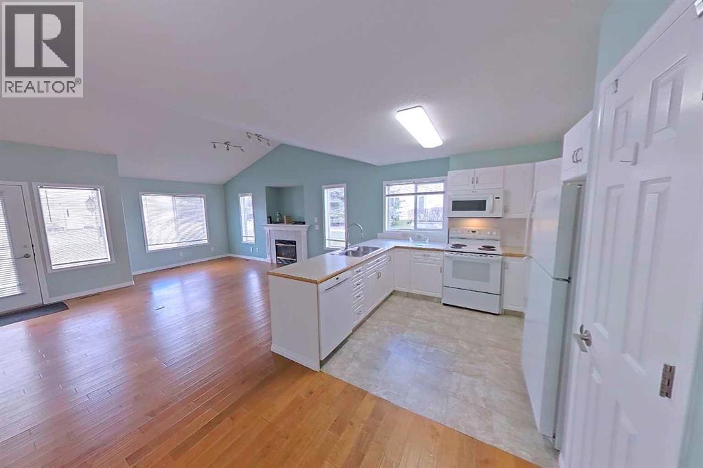 218 Centre Avenue W, Airdrie, Alberta  T4B 2M6 - Photo 10 - A2305162