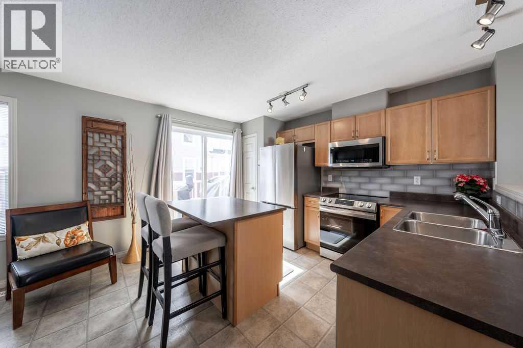 3038 New Brighton Gardens SE, Calgary, Alberta  T2Z 0A5 - Photo 8 - A2305096