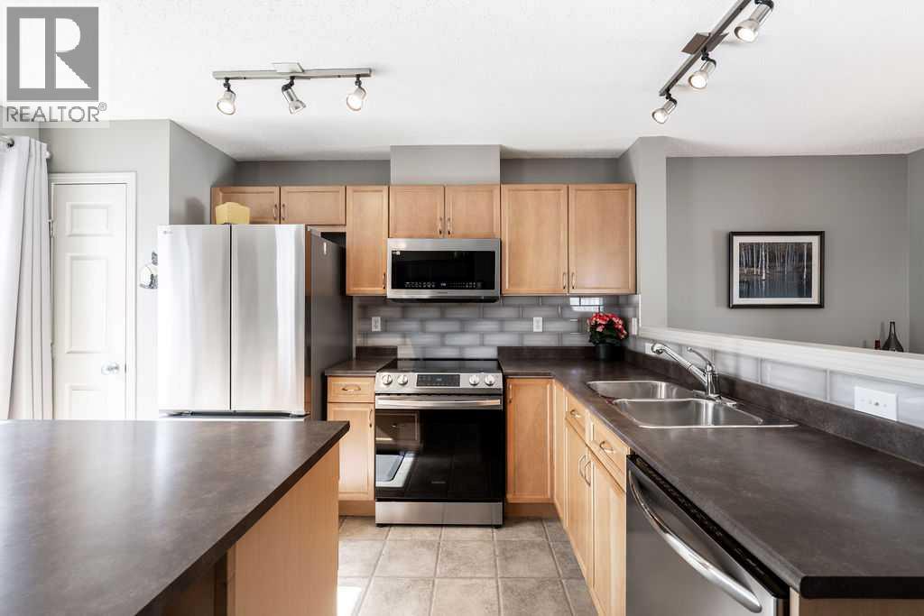 3038 New Brighton Gardens SE, Calgary, Alberta  T2Z 0A5 - Photo 9 - A2305096