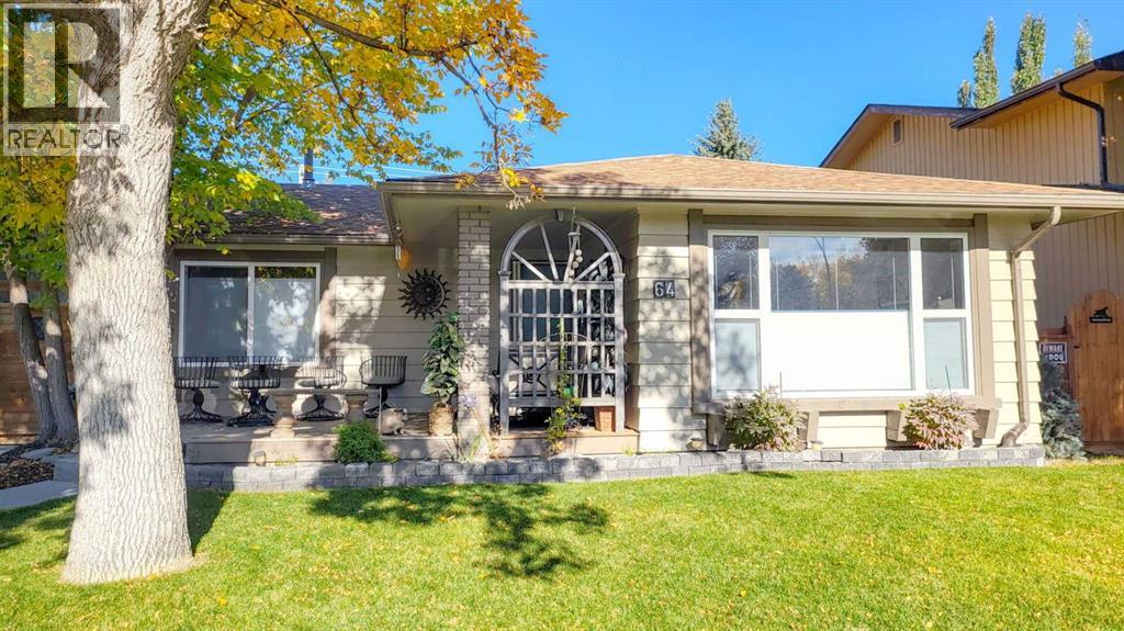 64 Midglen Drive SE, Calgary, Alberta  T2X 1G7 - Photo 2 - A2302754