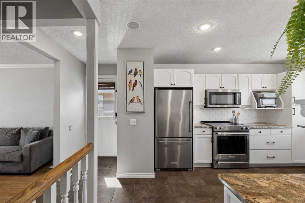 8011 Huntington Street Ne, Calgary, Alberta  T2K 5B8 - Photo 17 - A2303394