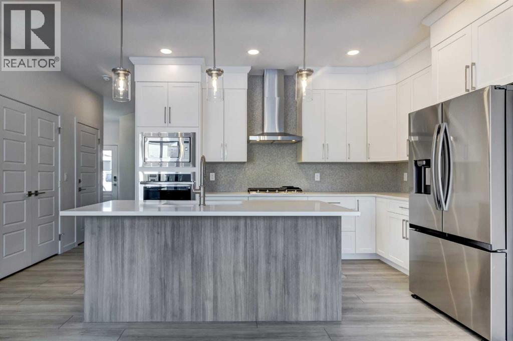 52 Magnolia Green SE, Calgary, Alberta  T3M 3X8 - Photo 3 - A2273468