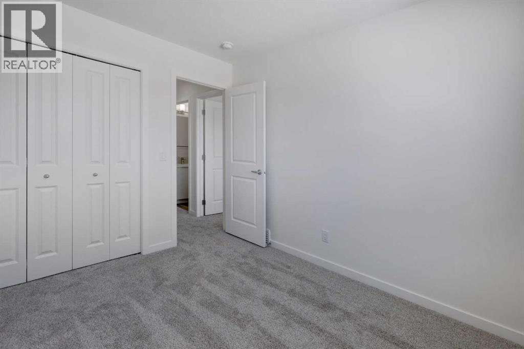 47 Lewisburg Manor NE, Calgary, Alberta  T3P 2N7 - Photo 21 - A2301813