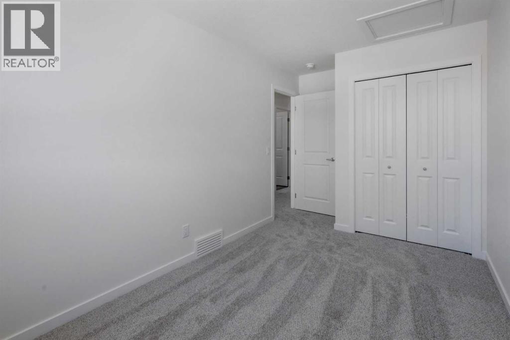 47 Lewisburg Manor NE, Calgary, Alberta  T3P 2N7 - Photo 19 - A2301813