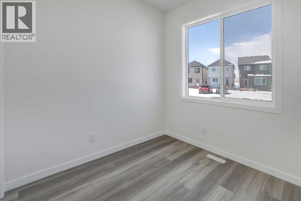 47 Lewisburg Manor NE, Calgary, Alberta  T3P 2N7 - Photo 10 - A2301813