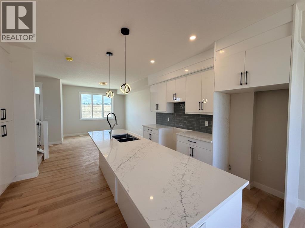 1927 Mccaskill Drive, Crossfield, Alberta  T0M 0C1 - Photo 4 - A2305127