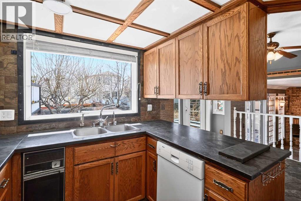 67 Woodstock Road SW, Calgary, Alberta  T2W 5W3 - Photo 12 - A2304479