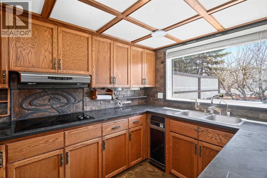 67 Woodstock Road SW, Calgary, Alberta  T2W 5W3 - Photo 11 - A2304479