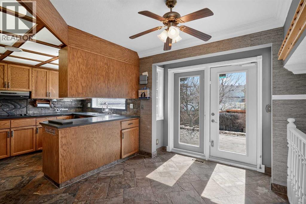 67 Woodstock Road SW, Calgary, Alberta  T2W 5W3 - Photo 8 - A2304479