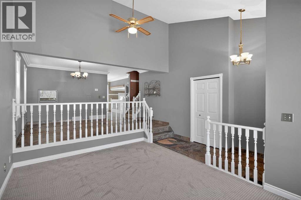 67 Woodstock Road SW, Calgary, Alberta  T2W 5W3 - Photo 5 - A2304479