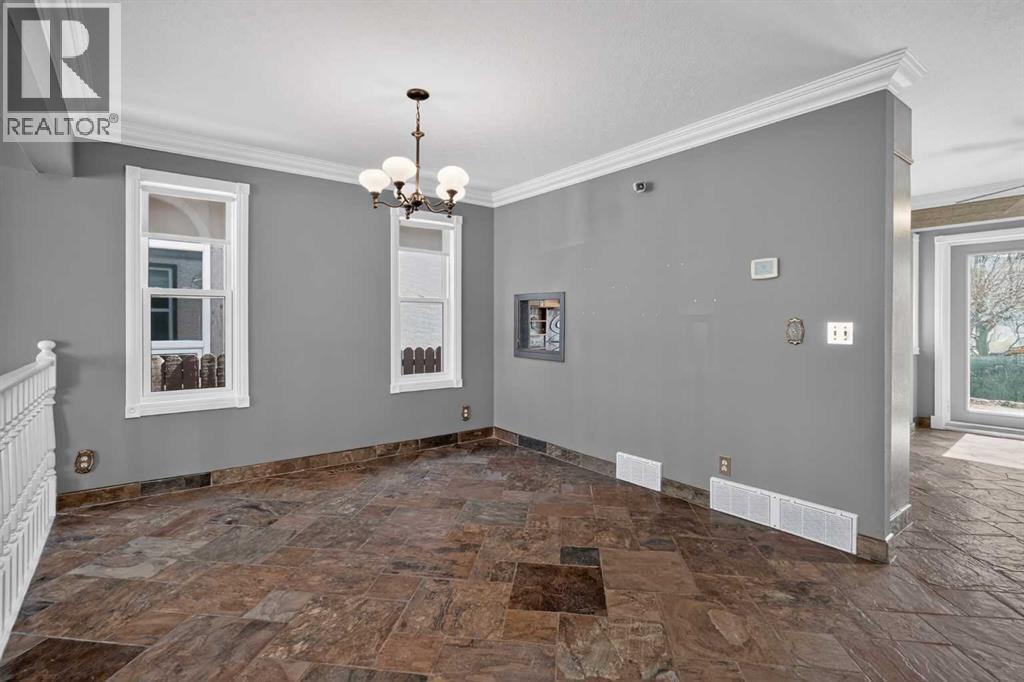 67 Woodstock Road SW, Calgary, Alberta  T2W 5W3 - Photo 7 - A2304479