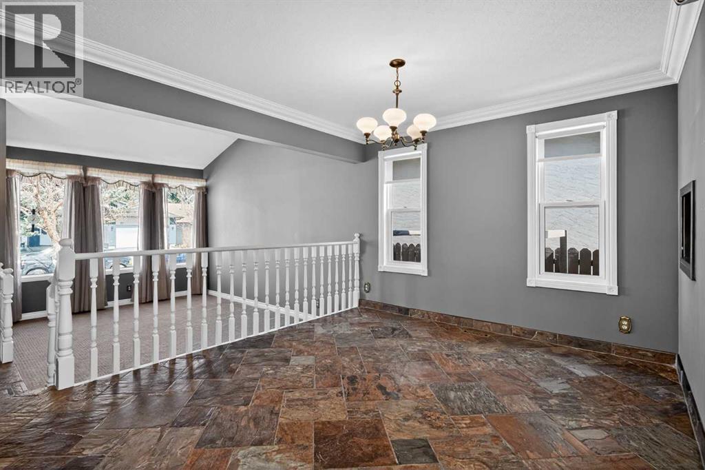 67 Woodstock Road SW, Calgary, Alberta  T2W 5W3 - Photo 6 - A2304479