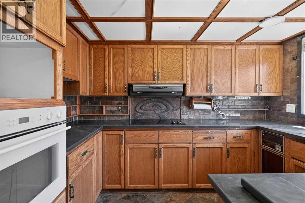 67 Woodstock Road SW, Calgary, Alberta  T2W 5W3 - Photo 10 - A2304479